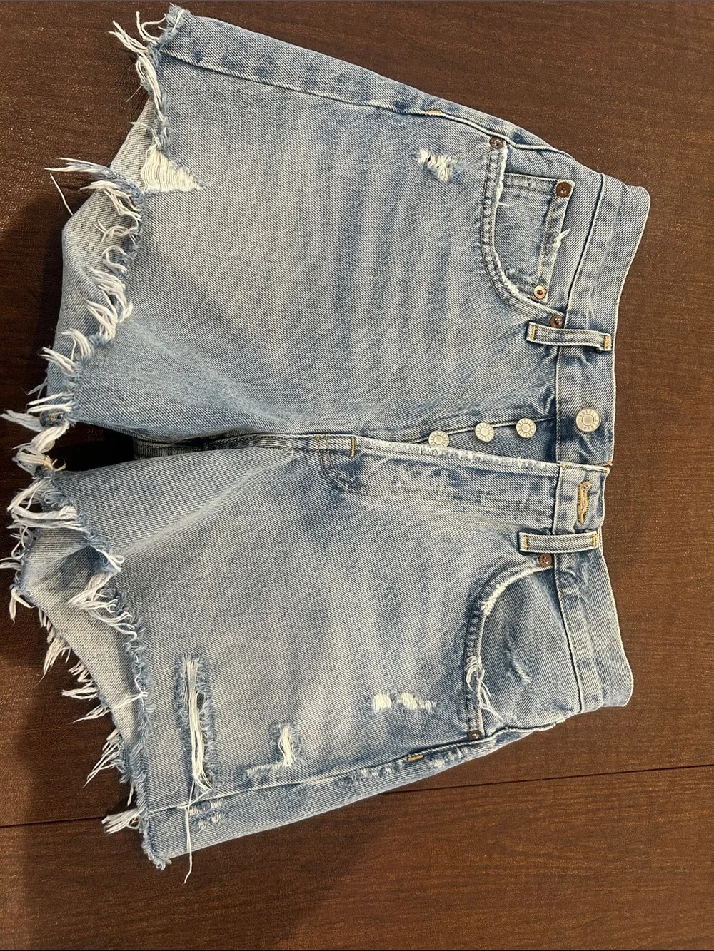 Agolde “Parker Long”High-Rise Light Blue Distressed Denim Shorts